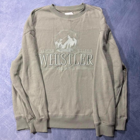 The North Face Tops - light green crewneck with forest details.